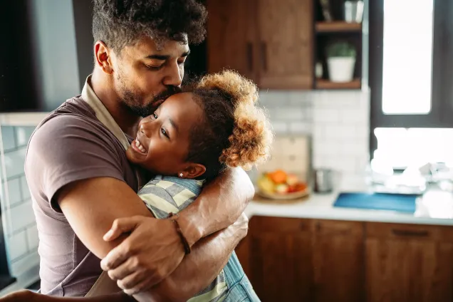 happy dad and daughter kitchen